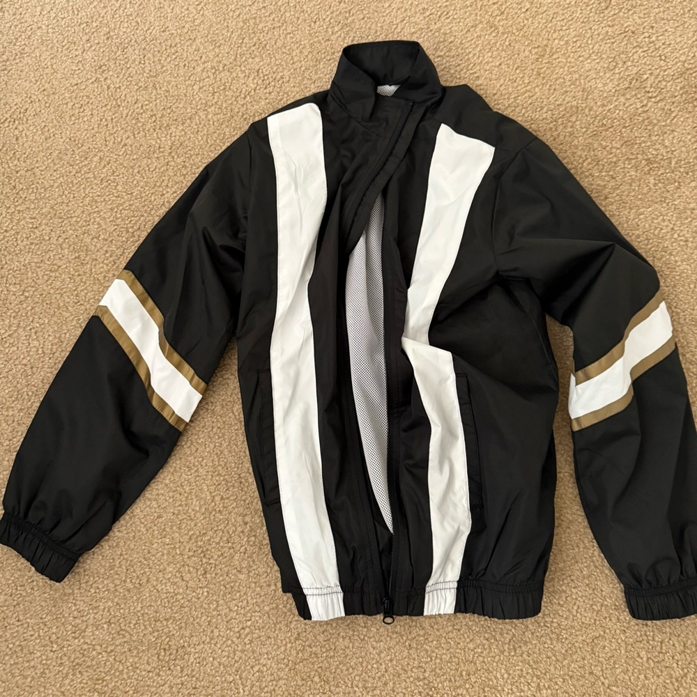 Stylish Black and White Jacket with Gold Accents